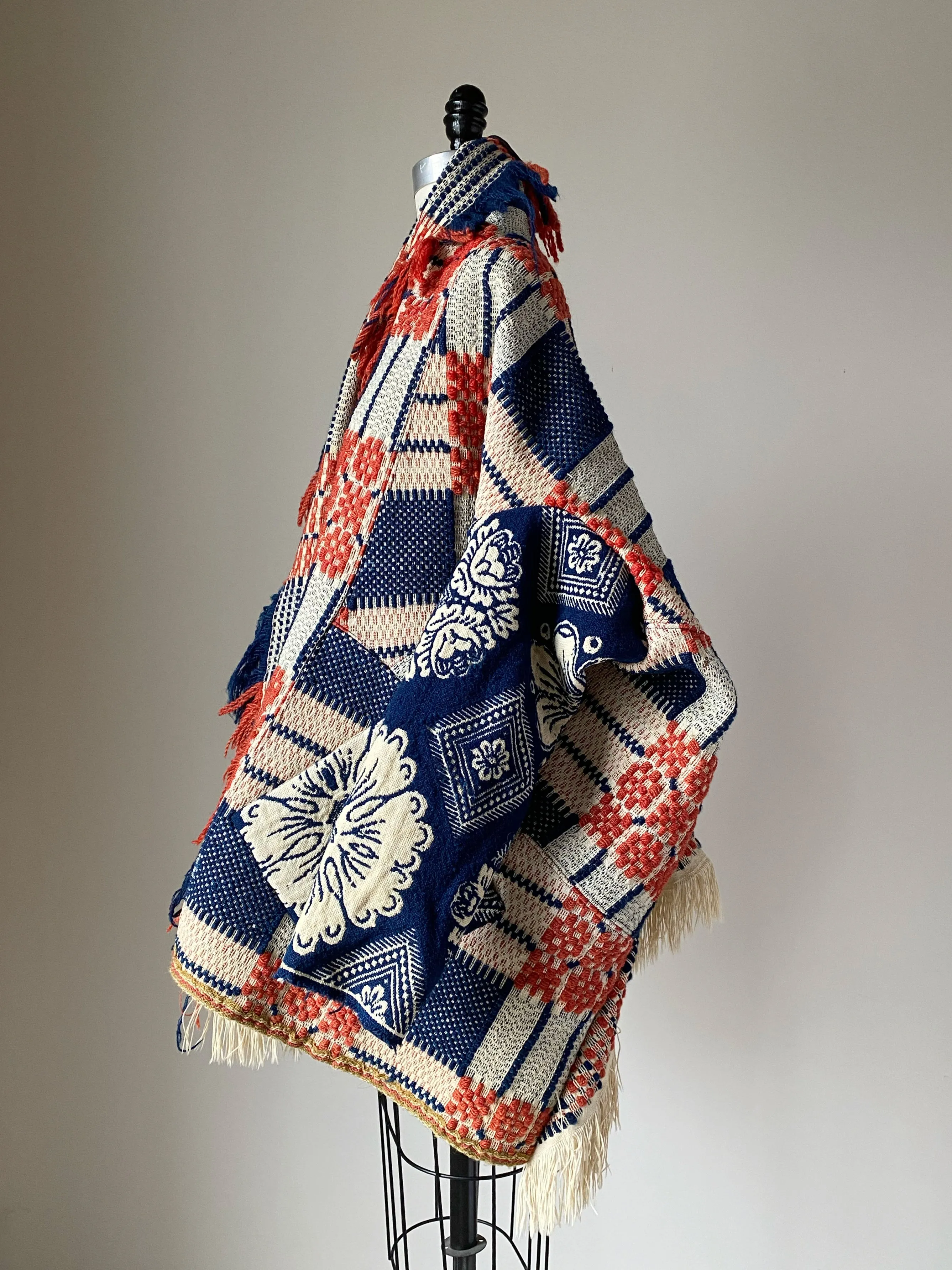 overshot coverlet cocoon with floral coverlet sleeves