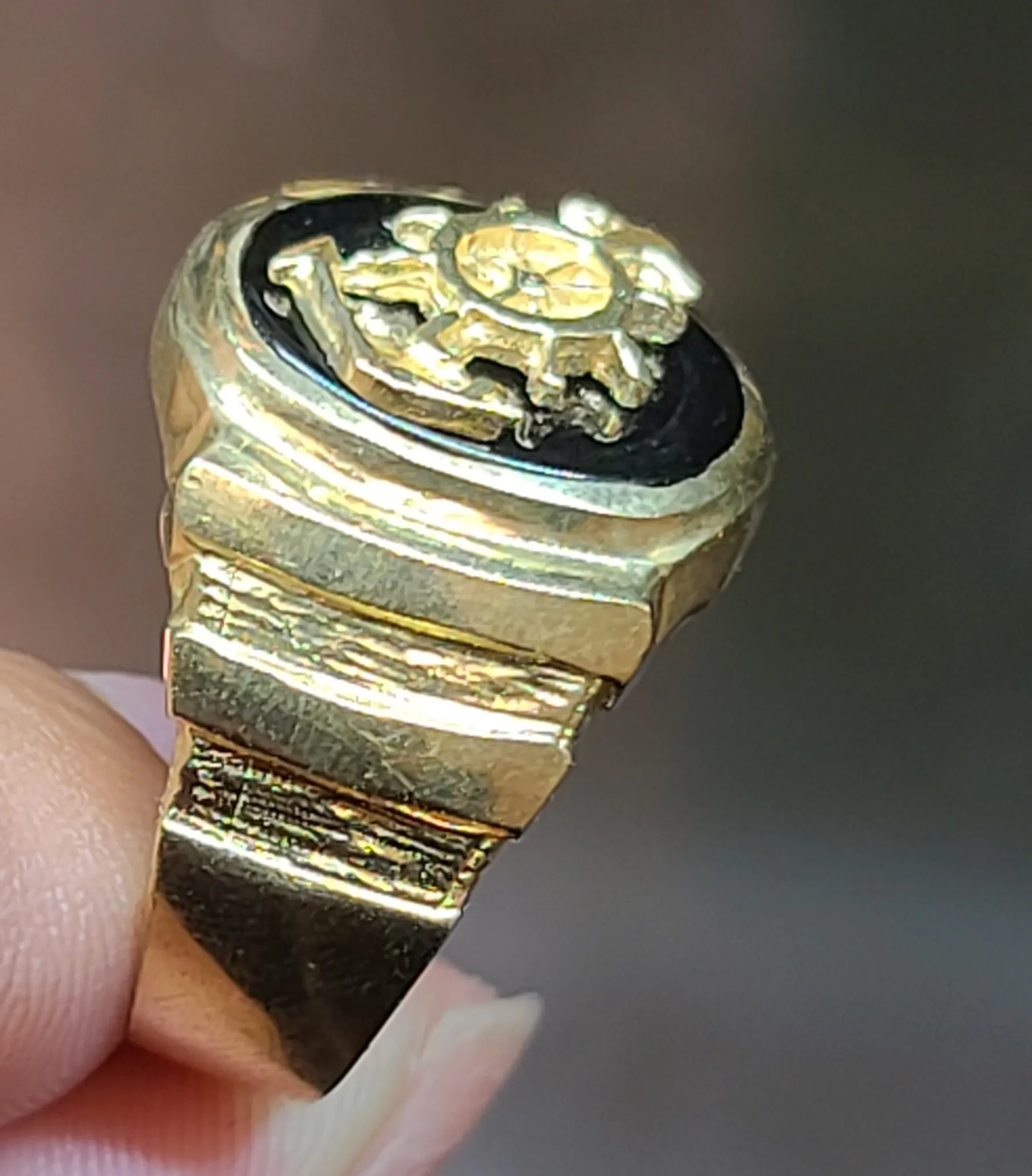 Yellow Gold Circular Ring With Ship Wheel